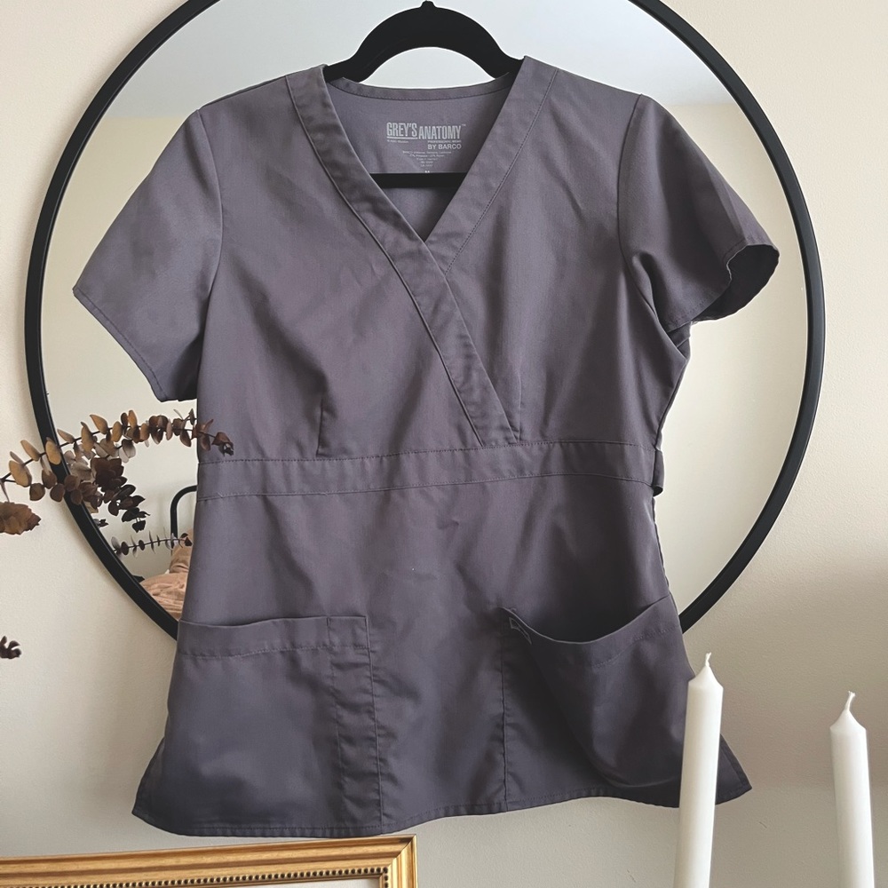 Granite color two pocket mock wrap scrub top from the Grey’s Anatomy collection